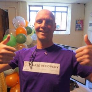 Chase Recovery team member celebrating success in Newcastle Under Lyme.